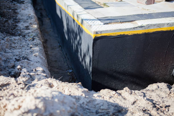 Professional Waterproofing technician working in Stevensville, MI